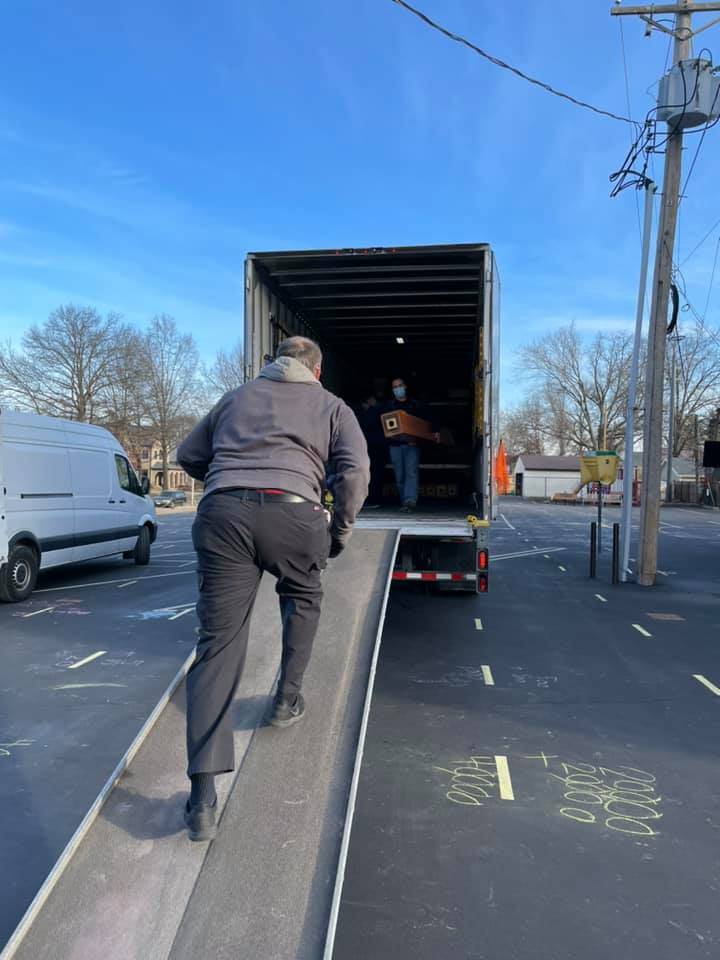 Unloading the truck- refinished wood pipes